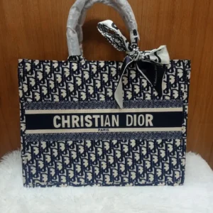 This image shows the CHRISTIAN D'IOR medium size Tote Bag. sale on this website. #womensbag #imported #ladiesbag #bag #christiandior #mediumsizebag #Universitybag.