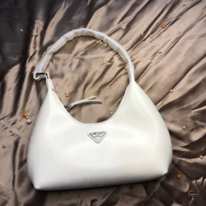 This image shows the Prada High Quality Shoulder Lady Armpit Adjustable Handle Bag sale on this website. #womensbag #imported #ladiesbag #bag.